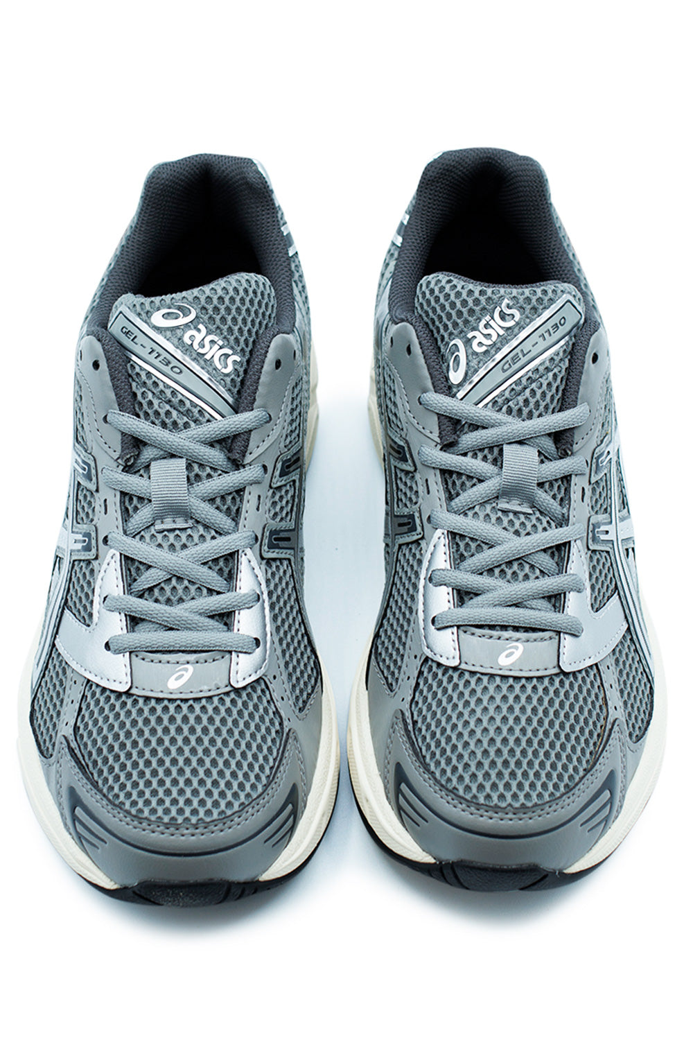 ASICS GEL-1130 Clay Grey Pure Silver side view showing sporty silhouette, grey-silver colorway and classic lace closure.