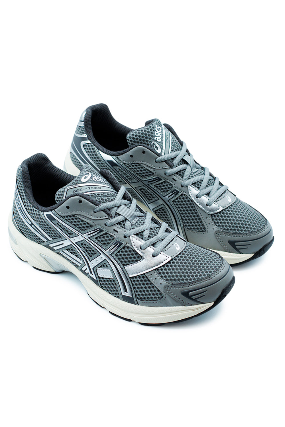 Detail shot of ASICS GEL-1130 Clay Grey Pure Silver mesh upper and synthetic leather overlays highlighting breathable construction.