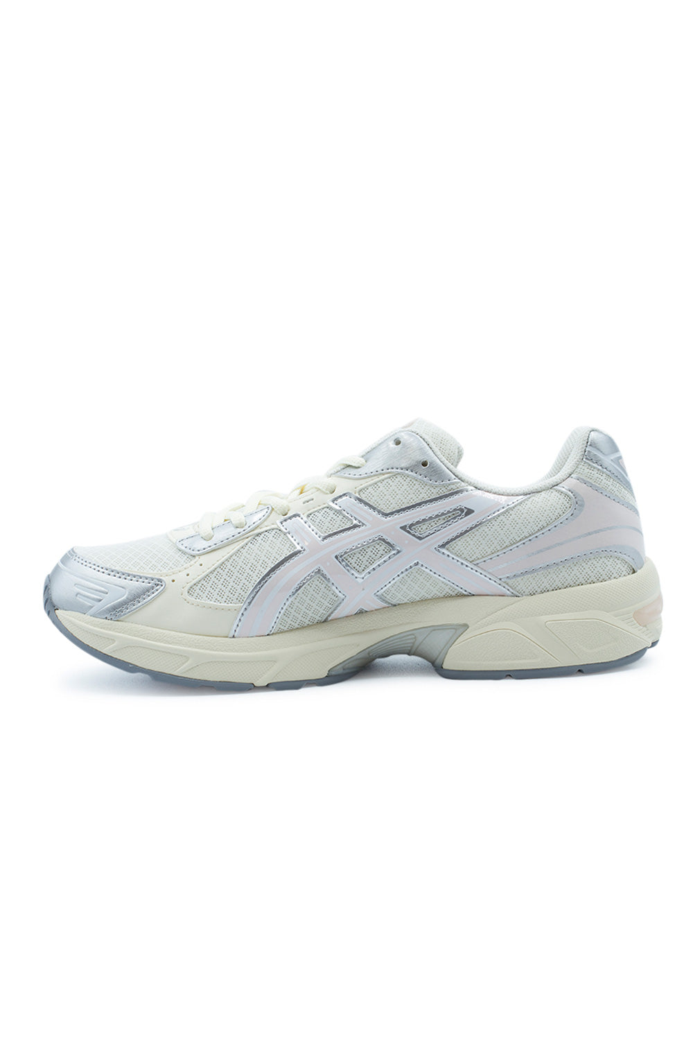Medial arch profile view of the Asics Gel-1130 sneaker, detailing the inner side cream synthetic cage structure over fine mesh, pastel pink tiger stripe accents, contoured EVA foam midsole, and integrated TRUSSTIC stability chassis.