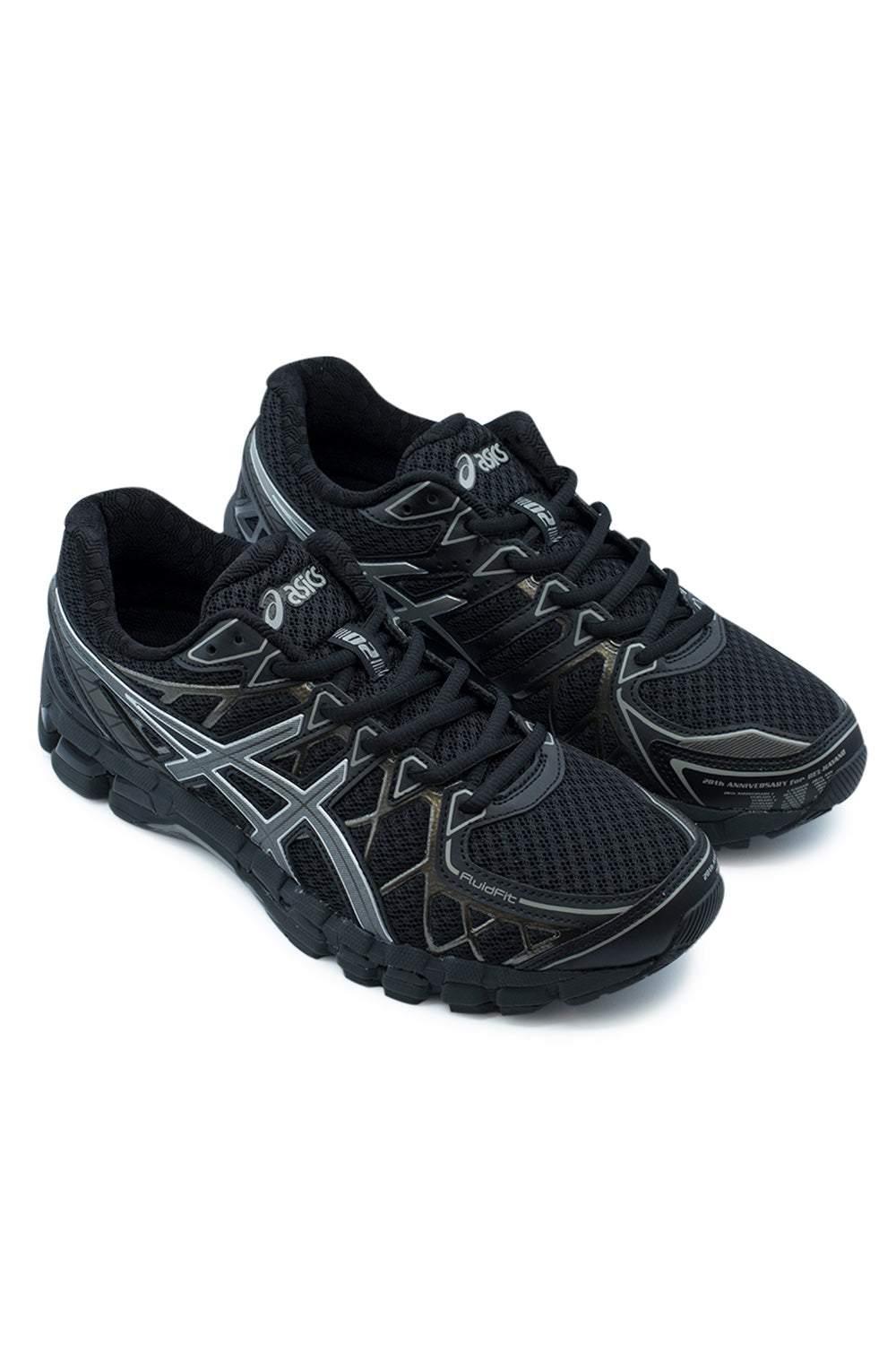Elevated three-quarter studio perspective of the Asics Gel-Kayano 20 in Black and Clay Grey, displaying the layered automotive and architectural design inspiration with sharp structural cage overlays, glossy synthetic accents, and a monochrome dark aesthetic.