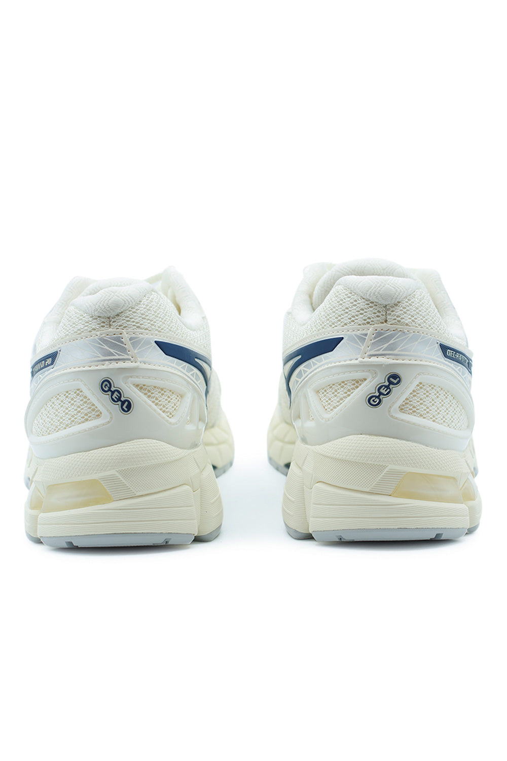 Rear angle of ASICS GEL-Kayano 20 sneaker highlighting FLUIDFIT heel support, layered synthetic overlays, GEL shock absorption cushioning and stability-focused running shoe architecture.