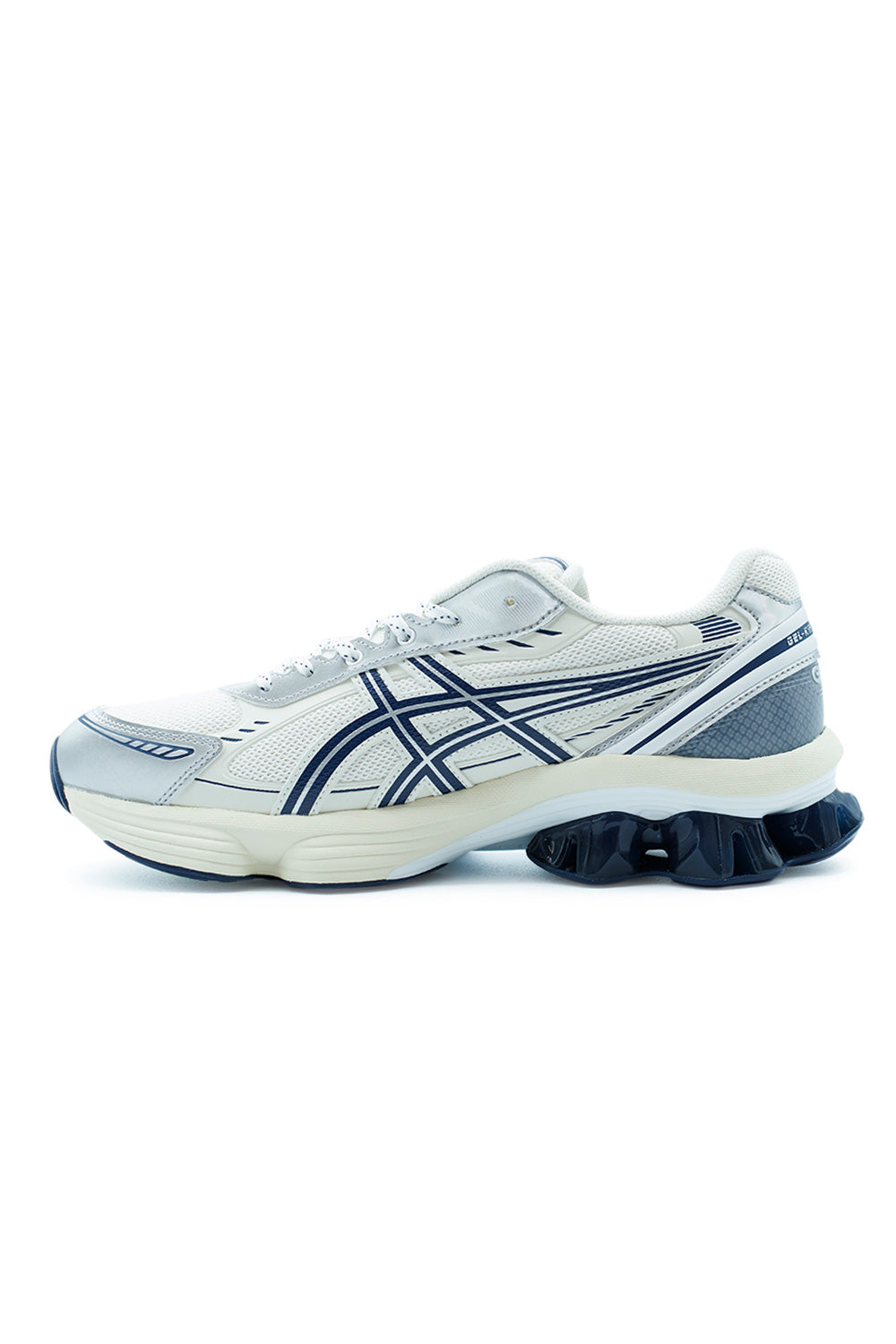 Side profile ASICS GEL-Kinetic Fluent sneaker combining retro 2010s running inspiration with modern comfort tech including Scutoid GEL shock absorption and FF BLAST PLUS ECO foam
