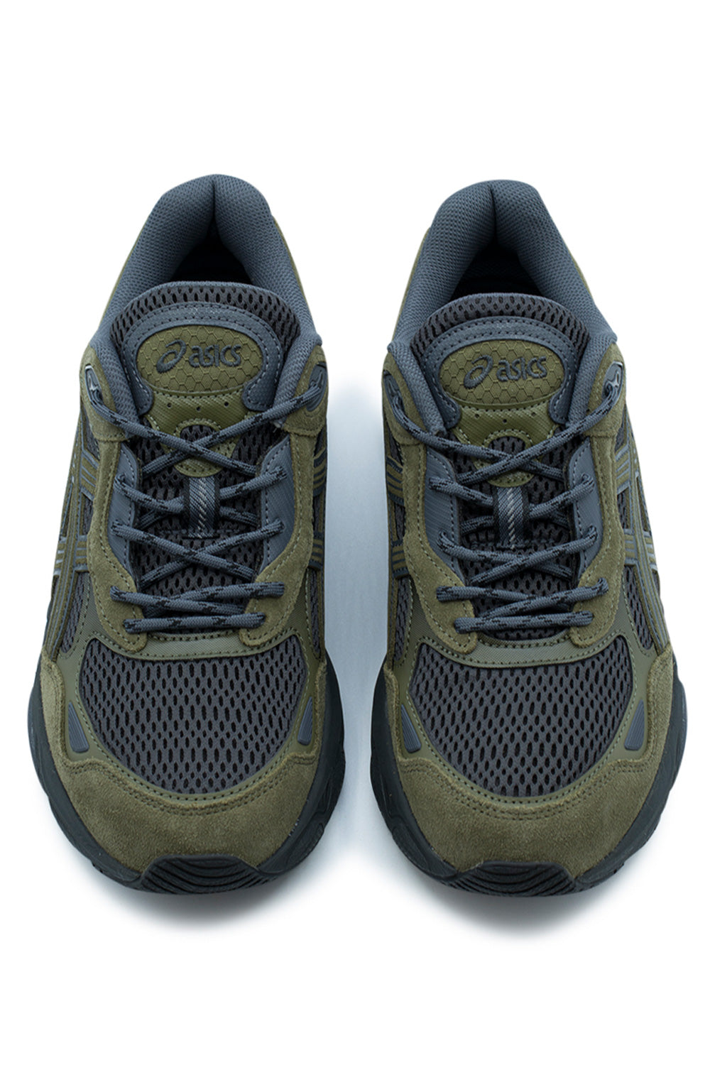 Top-down studio view of a pair of Asics Gel-NYC 2.0 shoes, highlighting the open-hole graphite grey mesh toe box, muted loden green suede mudguard with cutouts, two-tone patterned rope laces, and padded olive green textured tongue badges embroidered with the Asics logo