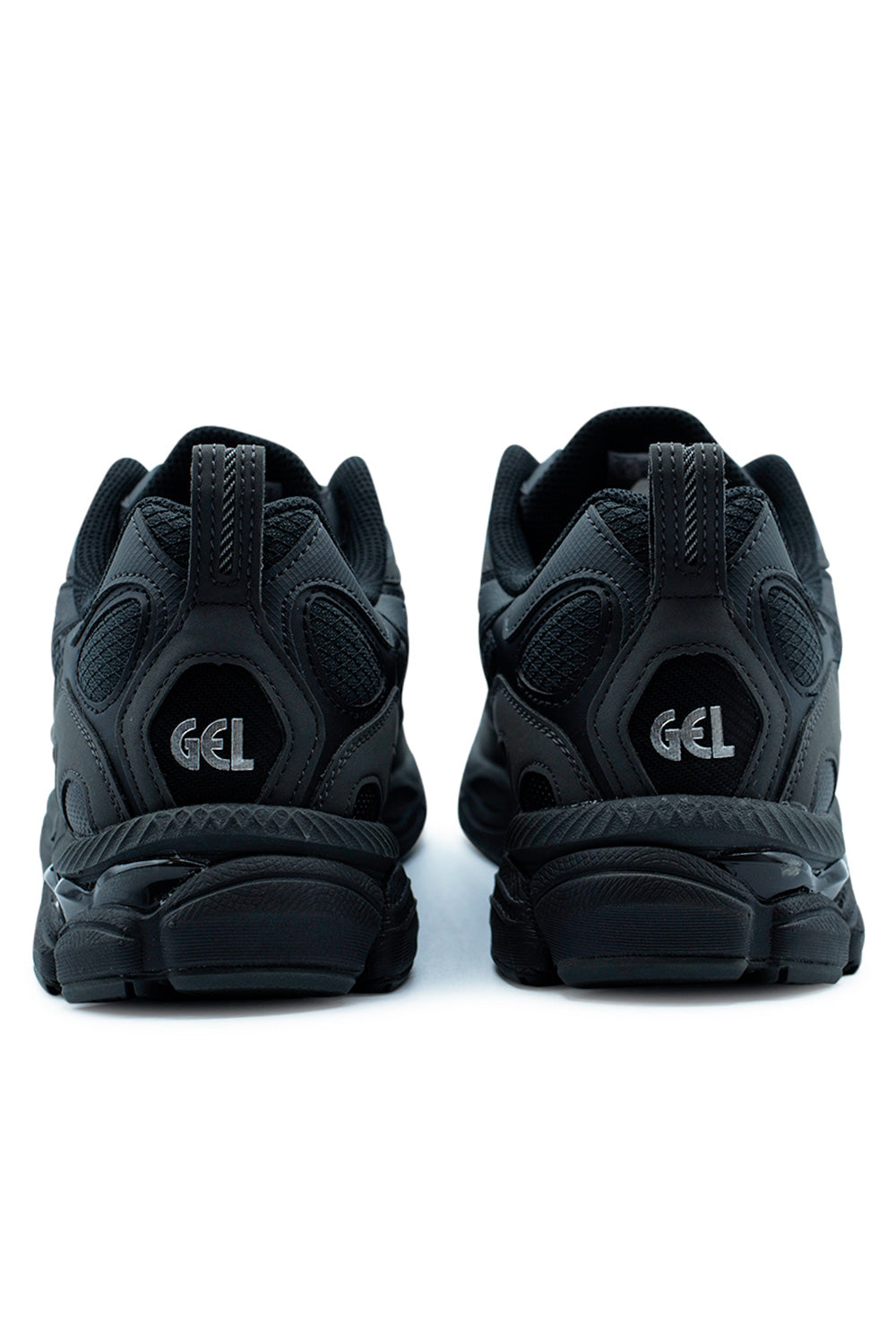 Rear view of the Asics GEL-NYC RGD Shoe Black/Graphite Grey featuring the reinforced heel counter, GEL cushioning logo and rugged midsole design inspired by early-2000s performance runners.