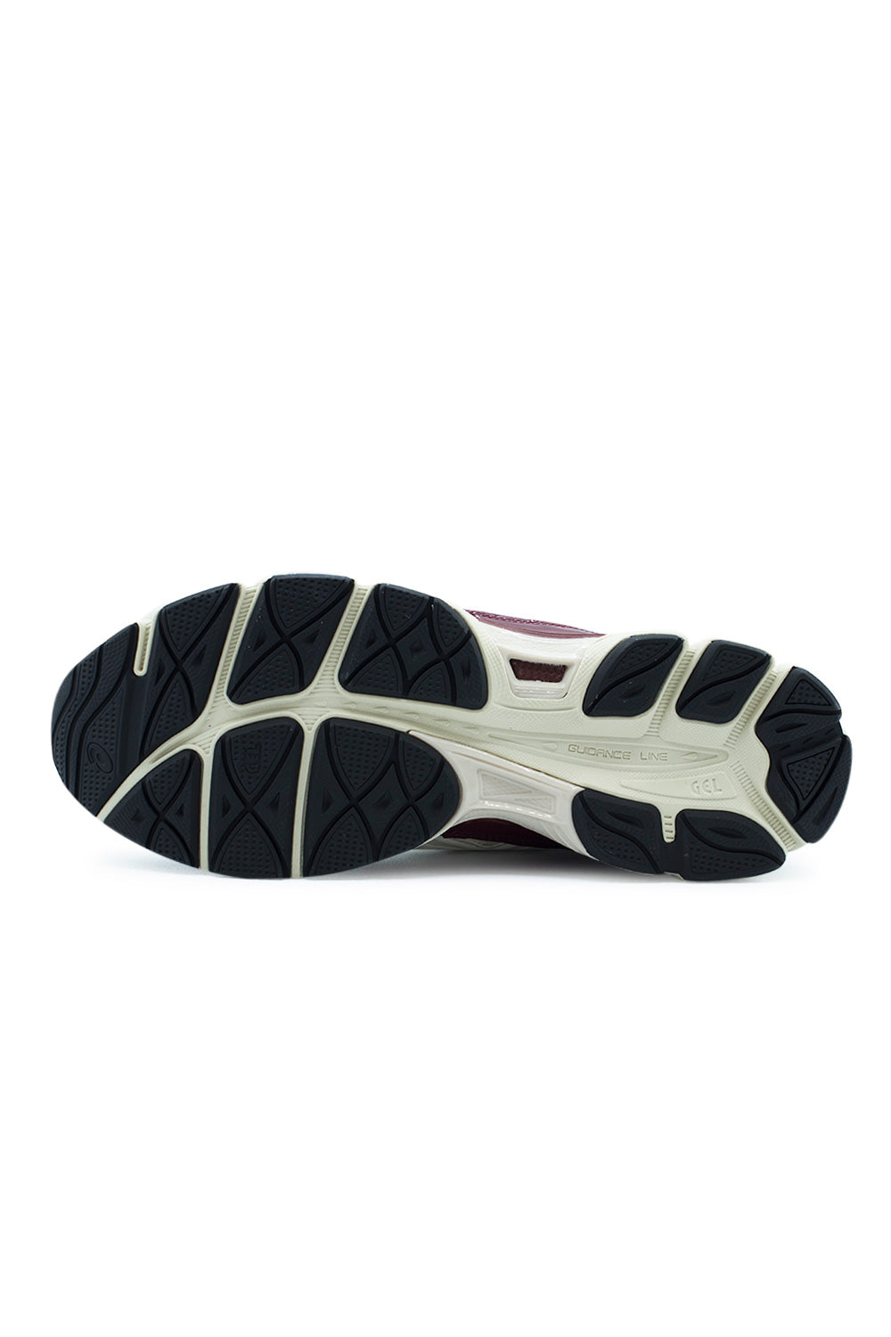 Full bottom perspective of the rubber outsole on the Asics Gel-NYC, displaying the black and cream traction pods, midfoot Trusstic stability shank, exposed impact Guidance Line flex groove, and debossed "GEL" brand logo