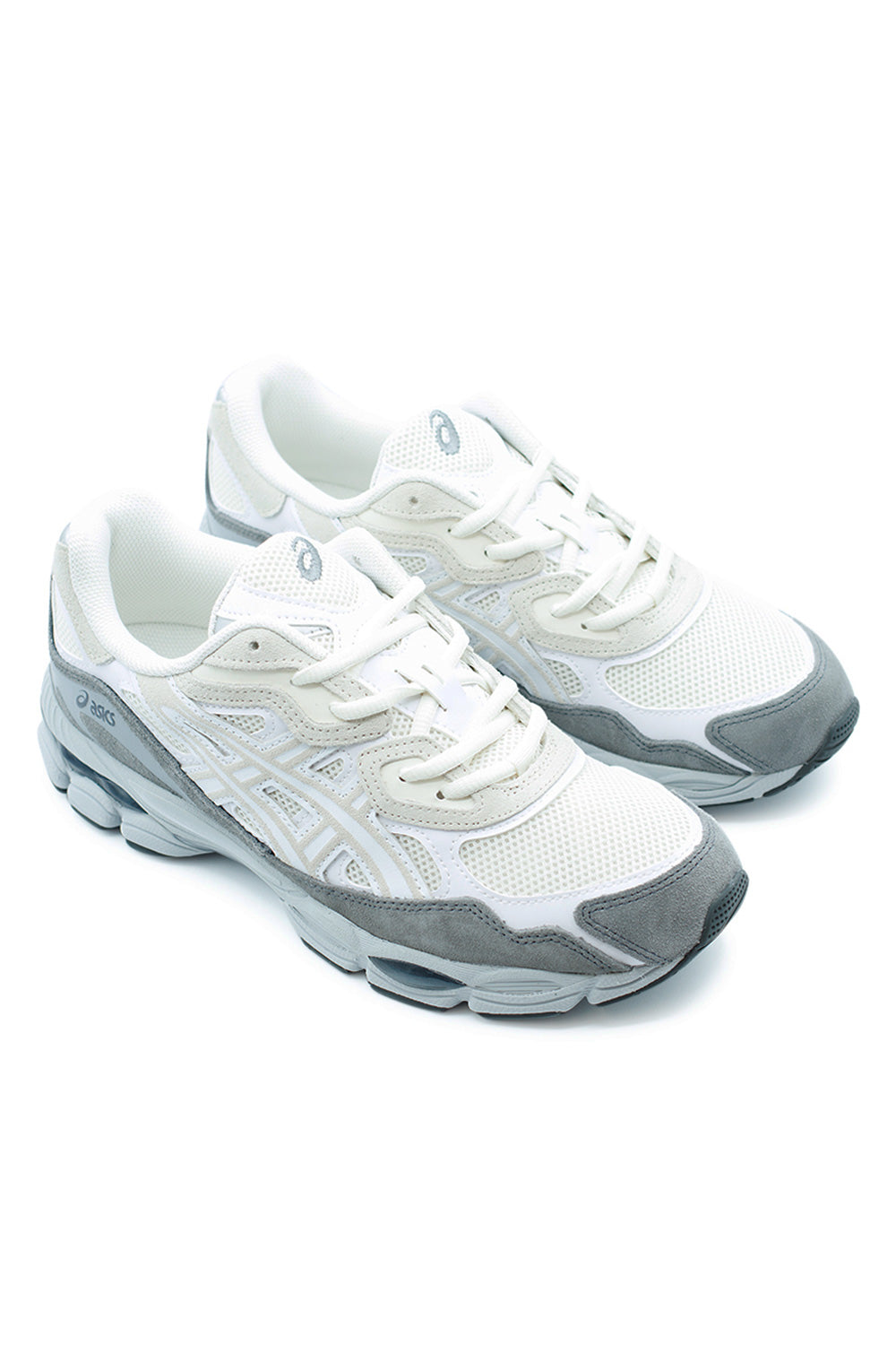 pair of Asics GEL-NYC cream white sneakers blending Y2K running aesthetics with modern streetwear style, perfect everyday sneaker with premium materials and comfort sole
