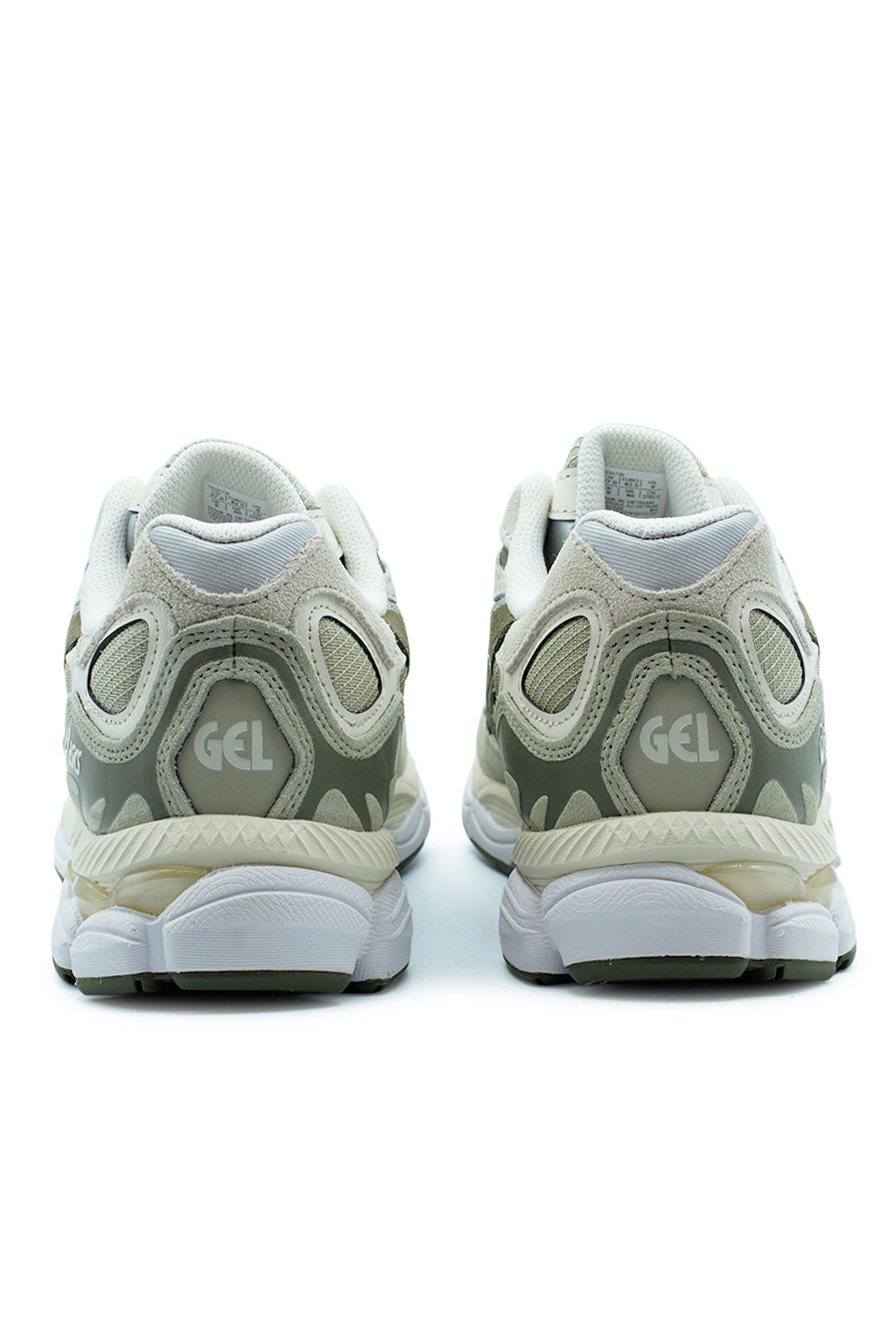 Rear heel view of the Asics GEL-NYC sneakers, showing the classic embossed GEL branding on the khaki heel counter and the layered technical midsole cushioning.