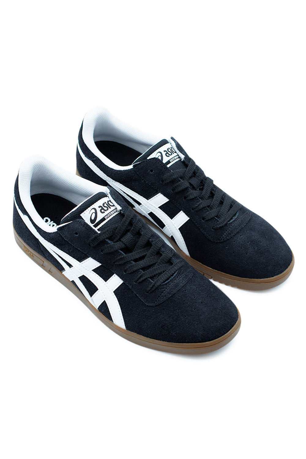 pair of Asics Gel-Vickka Pro skate shoes in black suede with white stripes and brown gum sole blending vintage court style with modern skate performance
