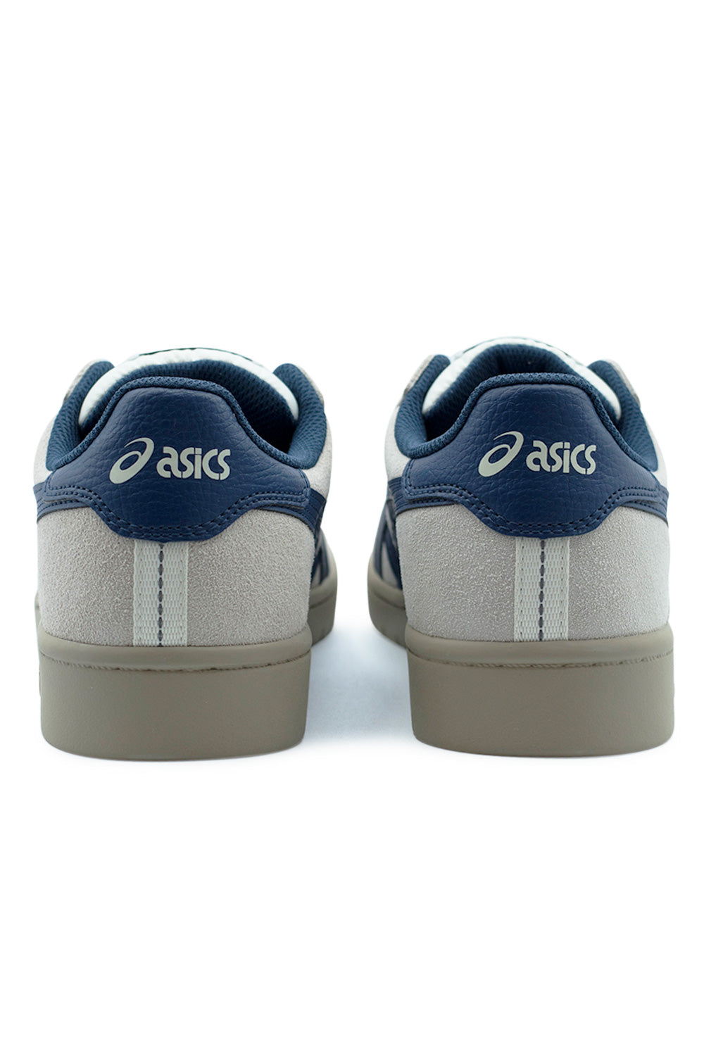 rear heel shot Asics Japan Pro skate shoe showcasing structured heel counter, padded collar and premium suede upper in cream with Independence Blue accents