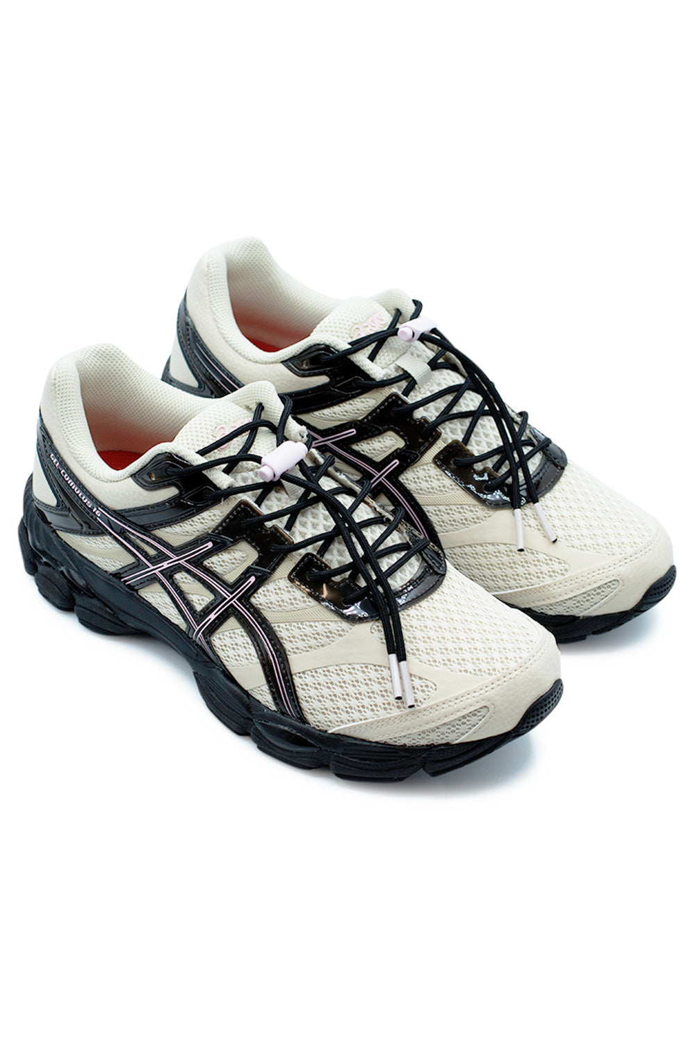 Asics x Finesse GEL-Cumulus 16 Desert Rose collaboration sneakers angled pair view highlighting beige technical mesh construction, black overlays and modern Y2K running shoe design