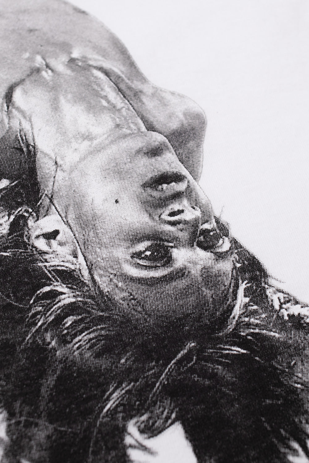 Detailed Iggy Pop bend pose artwork on Babylon LA collaboration t-shirt, white oversized punk-inspired tee blending skate culture, music history, and underground streetwear fashion