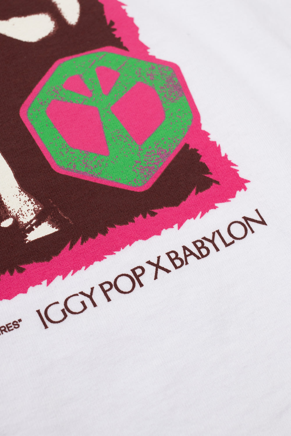 Detailed Babylon LA x Iggy Pop Raw Power graphic on white oversized t-shirt, premium USA-made cotton tee blending underground skate culture, vintage punk rock, and alternative streetwear style