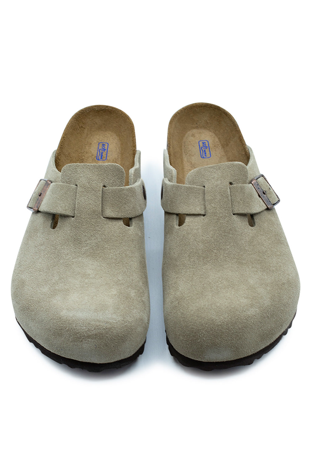 Top-down view of a pair of Birkenstock Boston BS Soft Footbed clogs in Taupe, highlighting the wide rounded suede toe box, instep buckle straps, and contoured suede-lined insoles with blue BIRKENSTOCK Soft Footbed text.