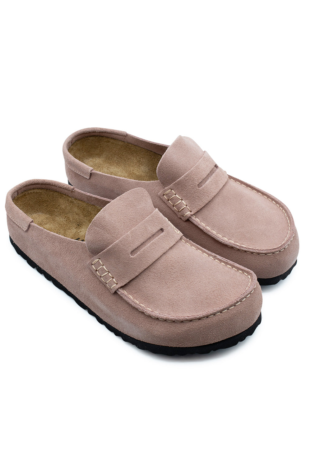Three-quarter perspective studio shot of the Birkenstock Naples Wrapped shoes in Pink Clay suede, showcasing the hybrid loafer-clog design, hand-stitched detailing, and cushioned footbed structure.