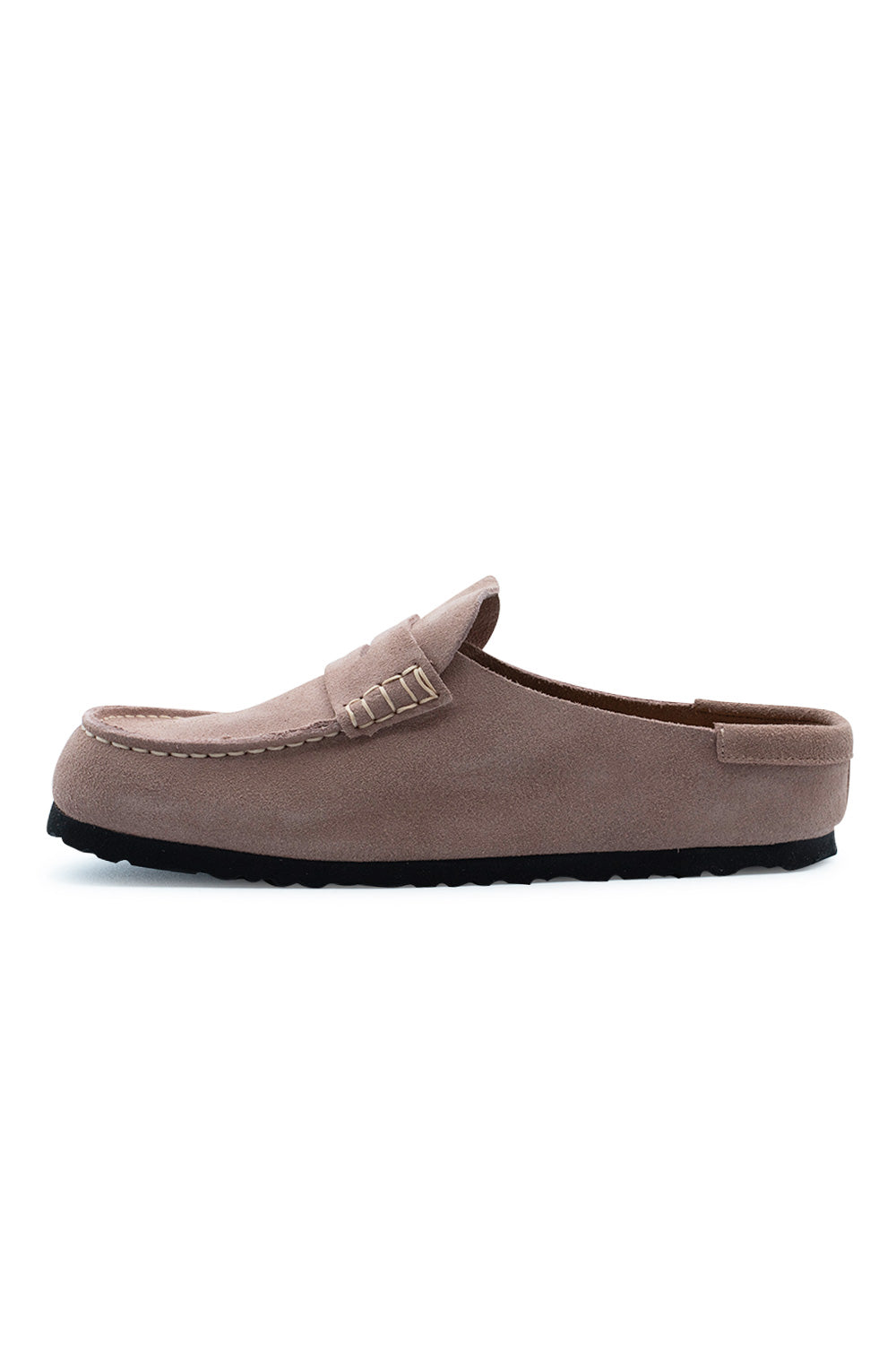 Medial side profile view of the Birkenstock Naples Wrapped Pink Clay clog, demonstrating the seamless inner suede quarter panel, low-slung silhouette, and dark rubber tread base.