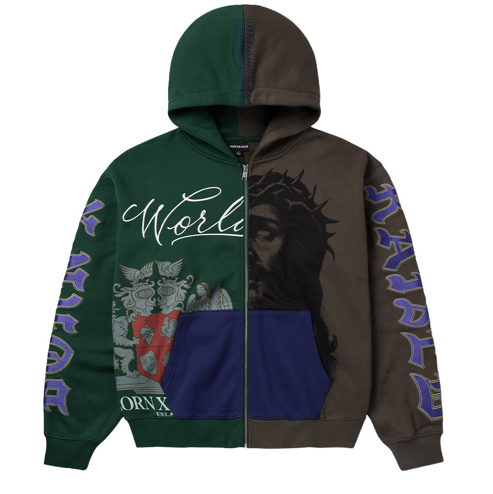 Front flat lay studio view of the Born X Raised Mashup Zip-Up Hoodie in multi-color, showcasing a heavyweight split-panel construction with forest green right side and charcoal brown left side, featuring a silver metal front zipper, contrasting deep royal blue split kangaroo pouch pockets, a large screen-printed Christ with Crown of Thorns portrait, heraldic family crest graphic, cursive script reading "World", and purple Old English Gothic typography along both sleeves.