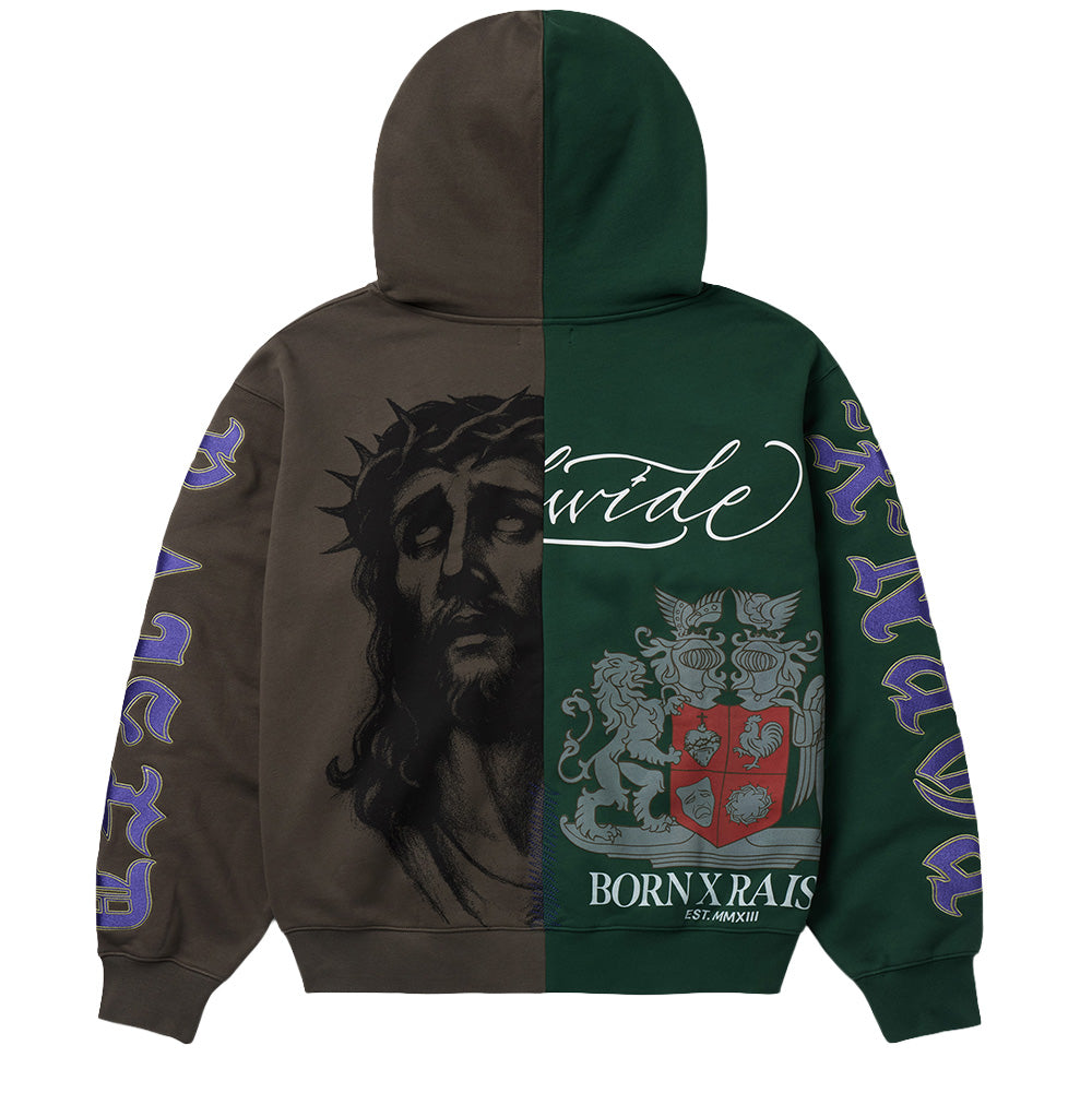 Back flat lay studio perspective of the multi-colored Born X Raised Mashup Zip-Up Hoodie, highlighting the reversed two-tone colorblock layout with charcoal brown on the left and bottle green on the right, decorated with an inverted oversized Christ portrait, continuous cursive script reading "wide", lower heraldic shield graphic with "BORN X RAISED EST. MMXIII" text, and arched purple Gothic lettering on the sleeves.