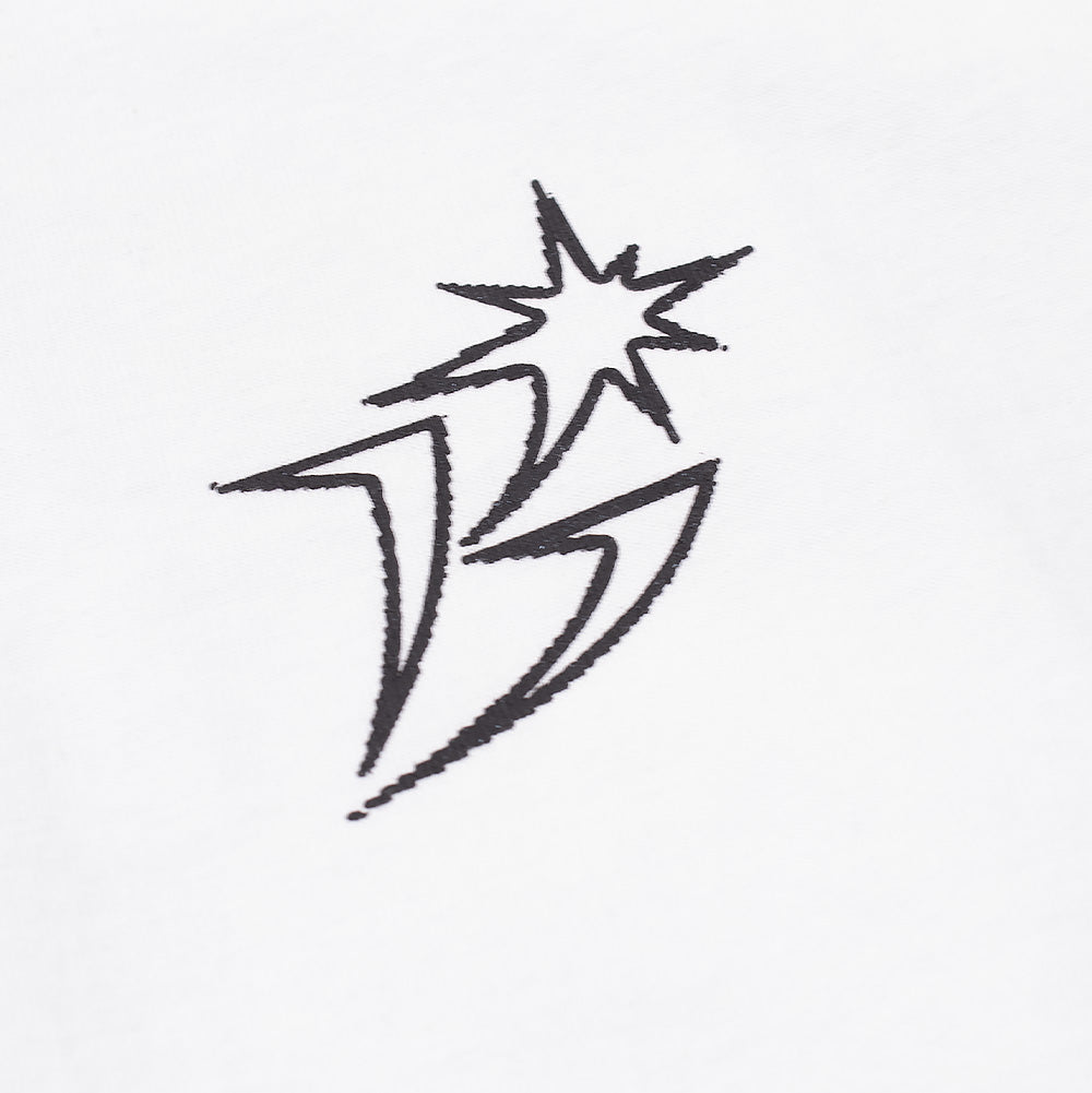 Macro perspective of the left chest branding on the BoTT Ultra T-Shirt, capturing the black satin-stitch embroidery forming the jagged, geometric lightning star "B" brand symbol against crisp white cotton fabric.