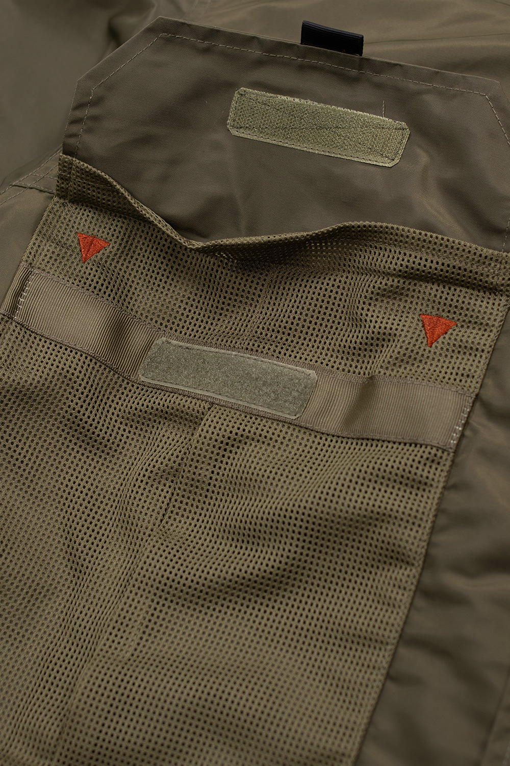 High-quality Brain Dead Cropped Chore Jacket Green, Los Angeles-inspired streetwear piece blending technical nylon with vintage workwear aesthetics.