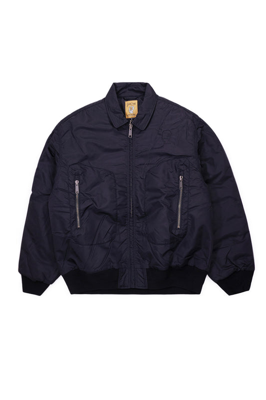 Brain Dead Embroidered 3D Flight Jacket Black, wide-fit bomber jacket with water-repellent nylon shell, orange quilted lining, and embroidered logohead.