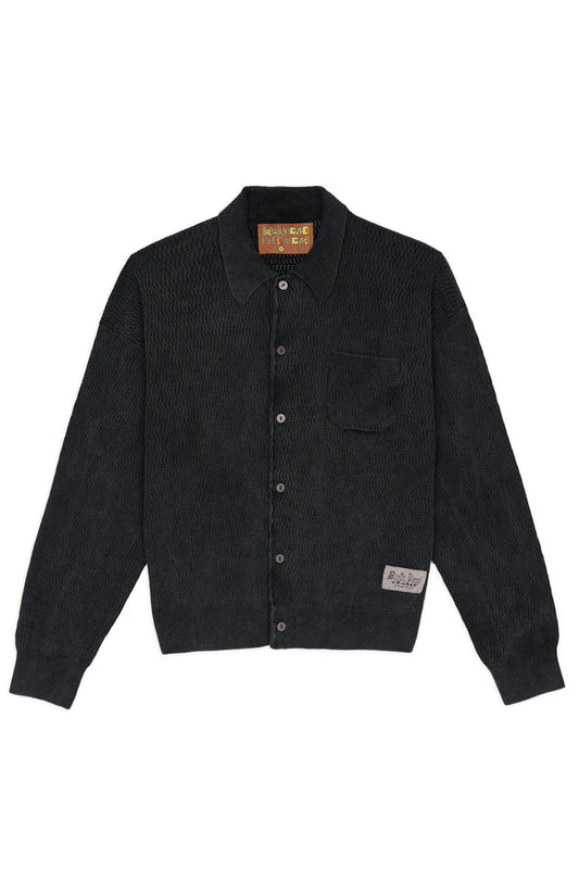 Brain Dead Pigment Dye Long Sleeve Polo Sweater Ink front view – loose boxy fit knitted polo shirt in finely woven pima cotton with chest pocket and button placket