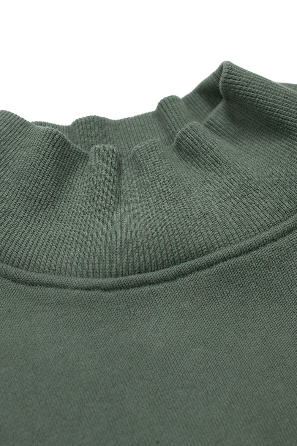 Close-up of Brain Dead Turtle Neck Sweatshirt Green showing ribbed turtle neck collar construction and heavyweight cotton french terry texture from the Los Angeles streetwear brand