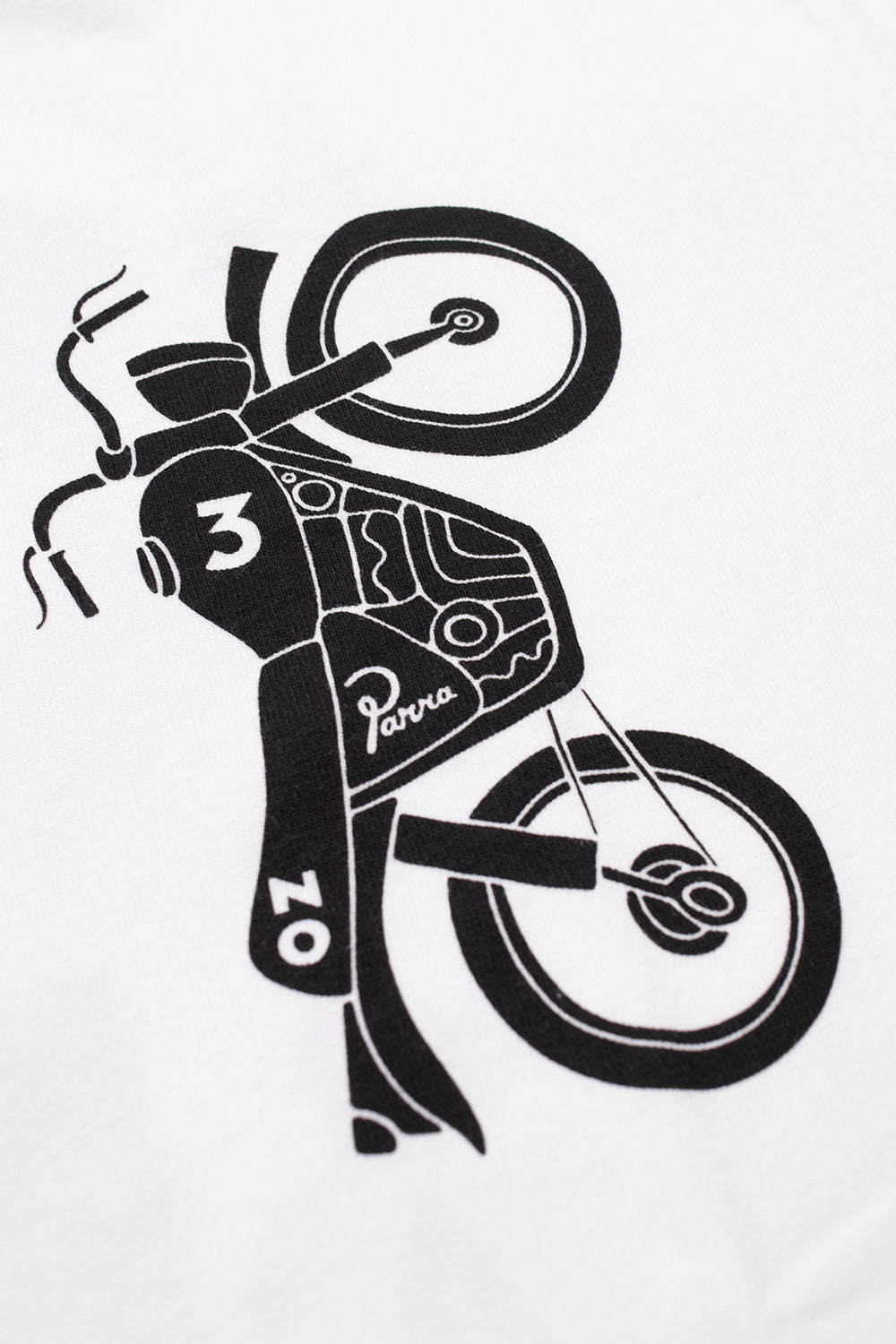 Detailed close-up shot of the front chest graphic on the By Parra Not Another Boat T-Shirt, showing the sharp black water-based ink screen print of an inverted vintage cafe racer motorbike accented with Parra signature script and graphic linework.