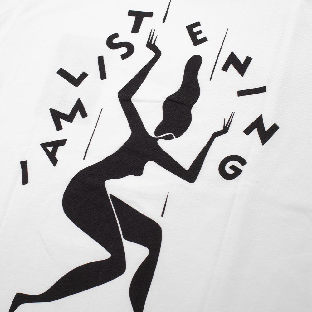 Detailed macro perspective of the back graphic on the white By Parra Not Listening T-Shirt, highlighting the sharp black screen-printed ink of the fluid silhouette character dancing amidst fragmented vertical lines and floating "I AM LISTENING" block lettering on white cotton fabric.