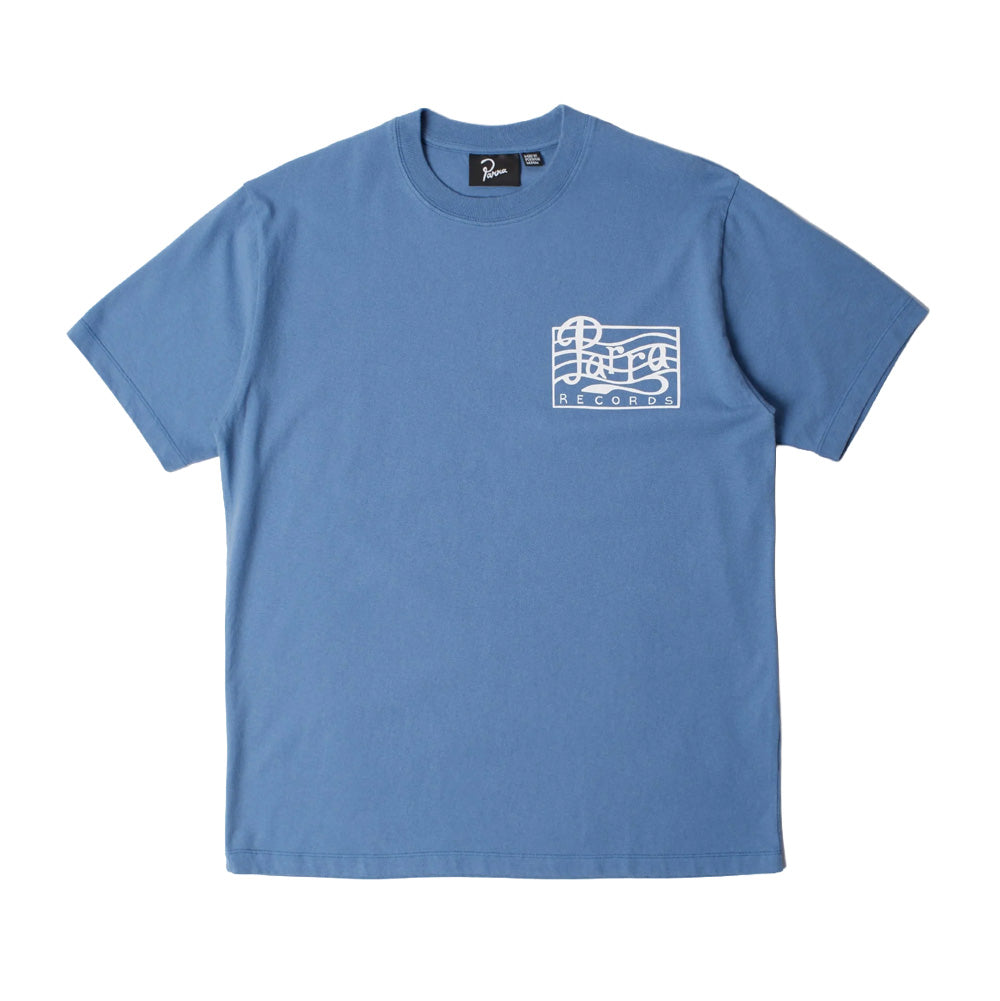 Front flat lay studio view of the blue By Parra Records T-Shirt, displaying a ribbed crewneck collar, black inner woven Parra tag, short sleeves, and a clean white outline version of the rectangular "Parra RECORDS" musical stave logo printed on the left chest.