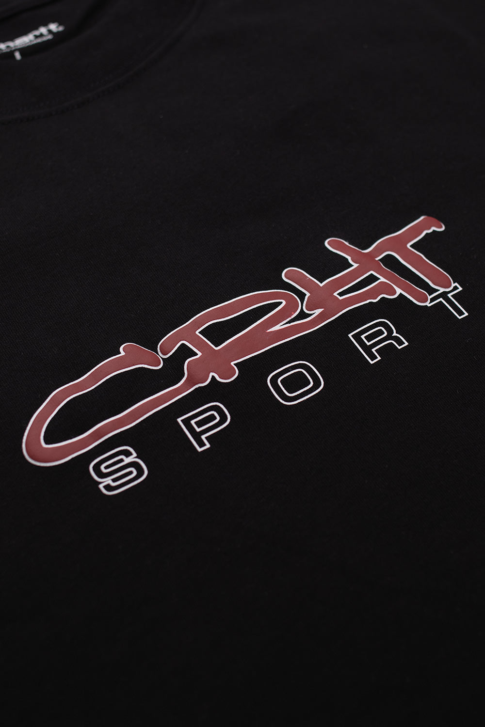 Carhartt WIP Lyntos T-Shirt Black – Rückseite mit 'Work In Progress' und 'Greatest Hits' Aufschriften sowie zusätzlichen grafischen Elementen