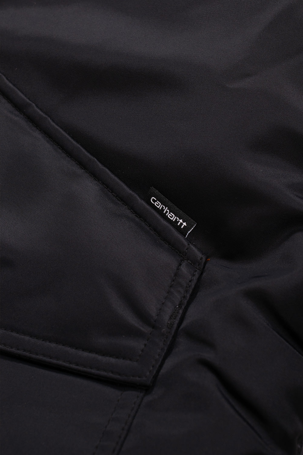 Carhartt WIP Olten Bomber Jacke Schwarz / Kurkuma