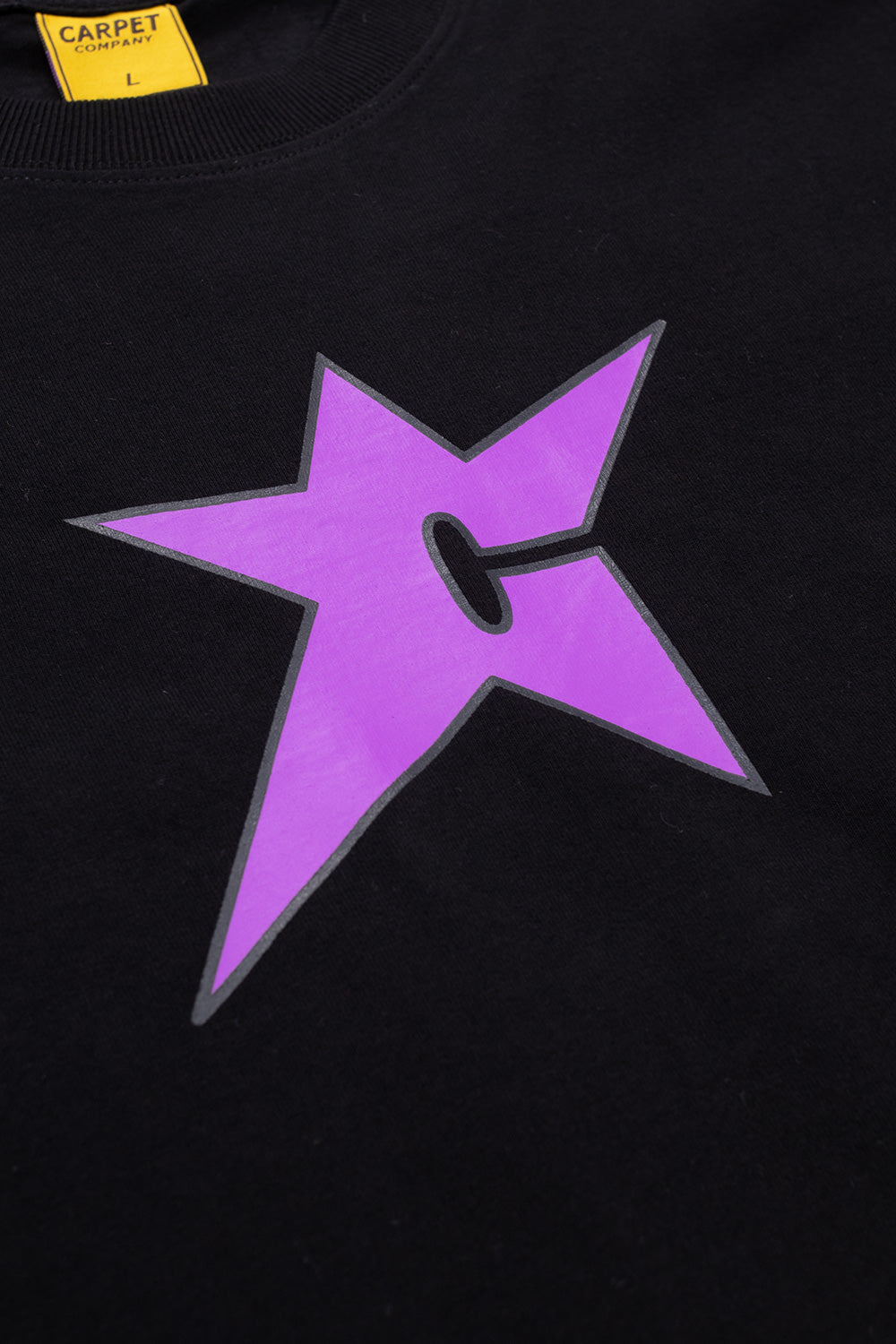 "Carpet Company C-Star T-Shirt in Schwarz – Modernes Design mit lila Print für urbane Looks"