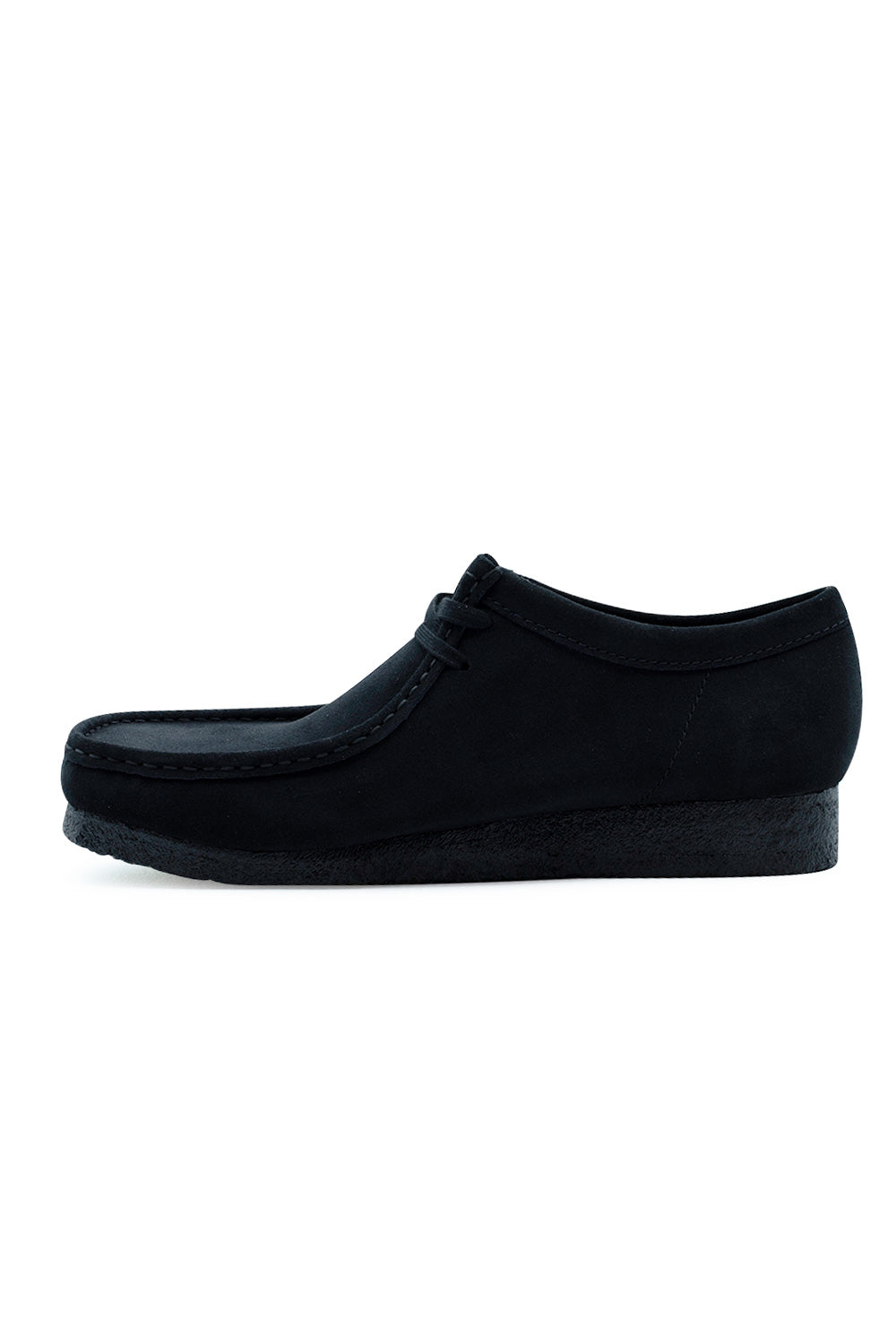Medial side profile view of the Clarks Originals Wallabee Black Suede shoe, illustrating the clean inner suede quarter panel, precise collar stitching, and continuous black natural crepe outsole.