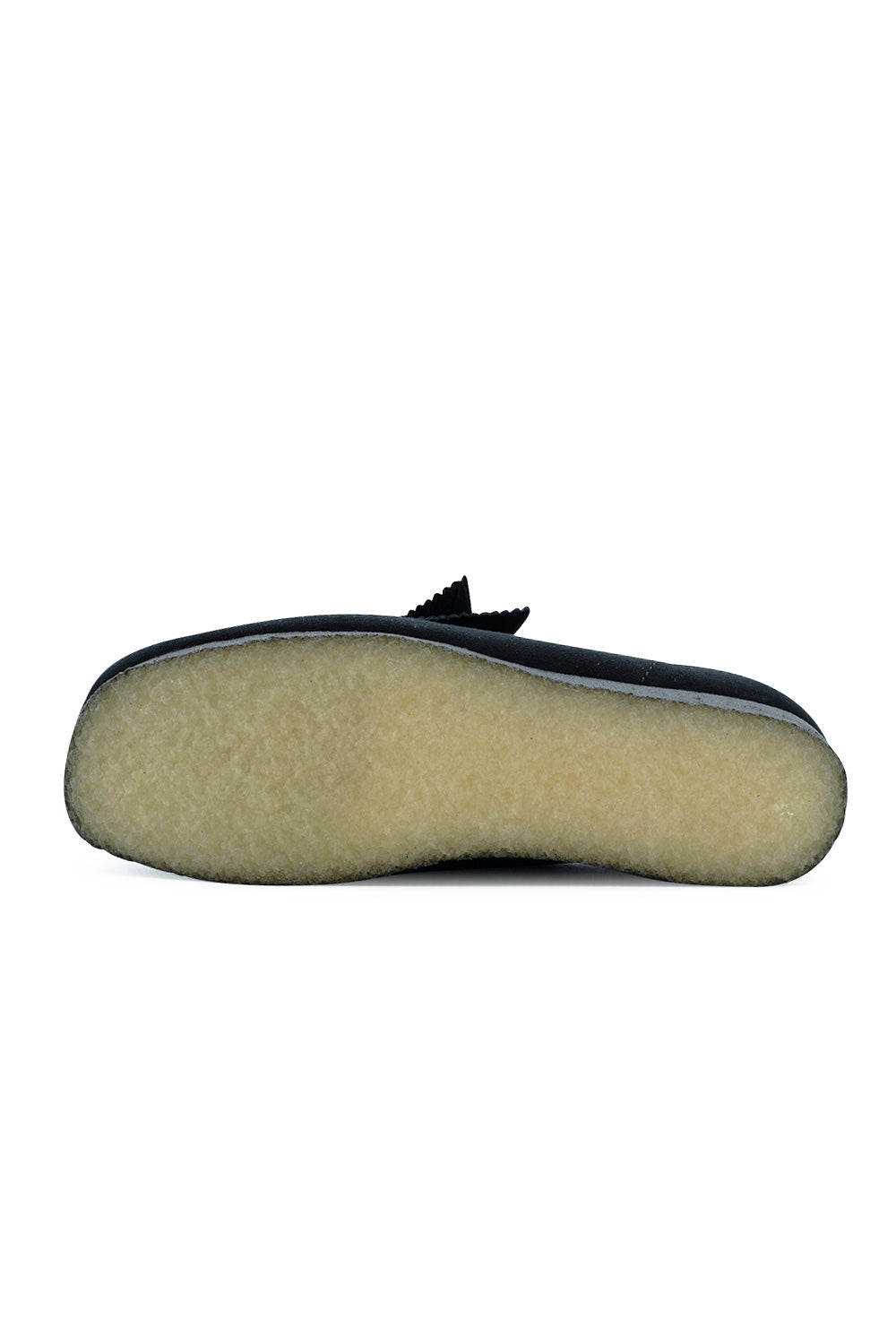 Full bottom view of the natural rubber pebble crepe outsole on the Clarks Originals Wallabee Black Suede shoe, displaying the signature textured bottom for durable cushioning and natural grip.