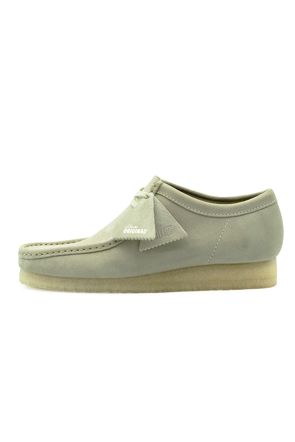 Lateral side profile view of the Clarks Originals Wallabee shoe in Maple Suede, showcasing the premium warm beige suede upper, classic moccasin structural apron stitching, natural rubber pebble crepe sole, and matching Clarks Originals fob tags.