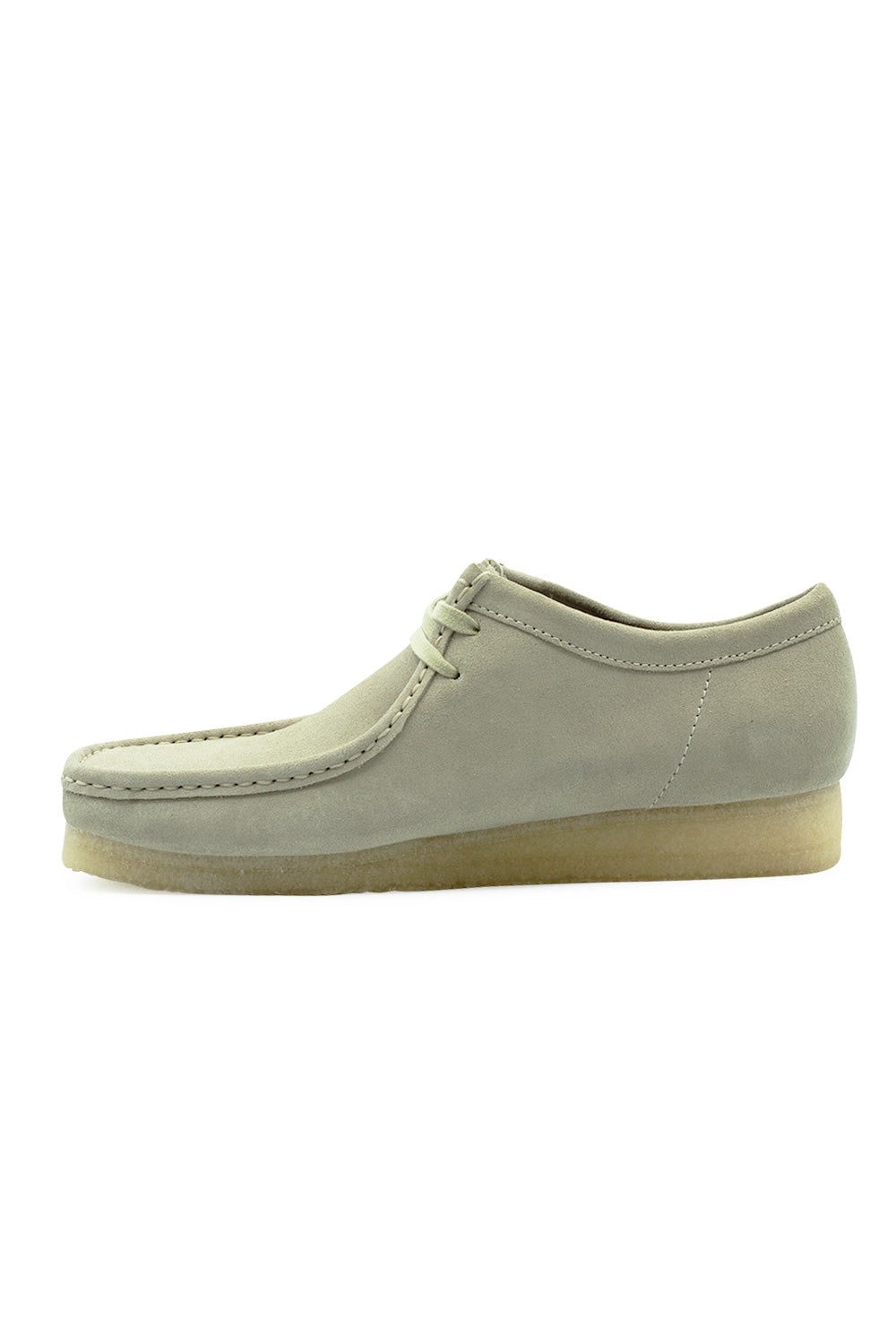 Medial side profile view of the Clarks Originals Wallabee Maple Suede shoe, illustrating the continuous soft suede midfoot panel, clean collar line, and natural textured crepe outsole.