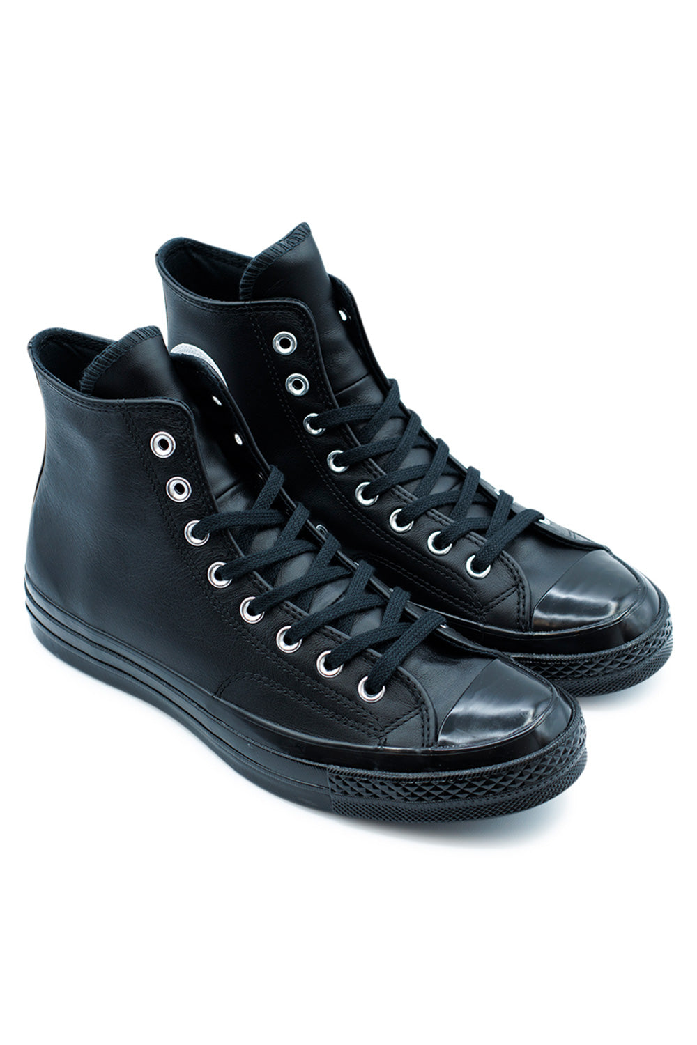 Side view of Converse Chuck 70 Hi Black Black White, premium leather basketball-inspired sneaker with cotton laces and aluminium eyelets.