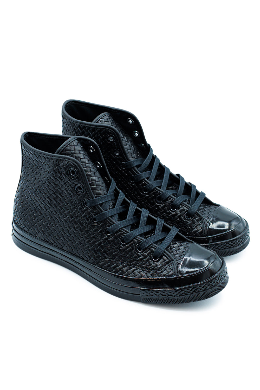 Side view of Converse Chuck 70 Hi Woven Leather Black, premium high-top leather shoe with intricate weave detailing and metal eyelets.