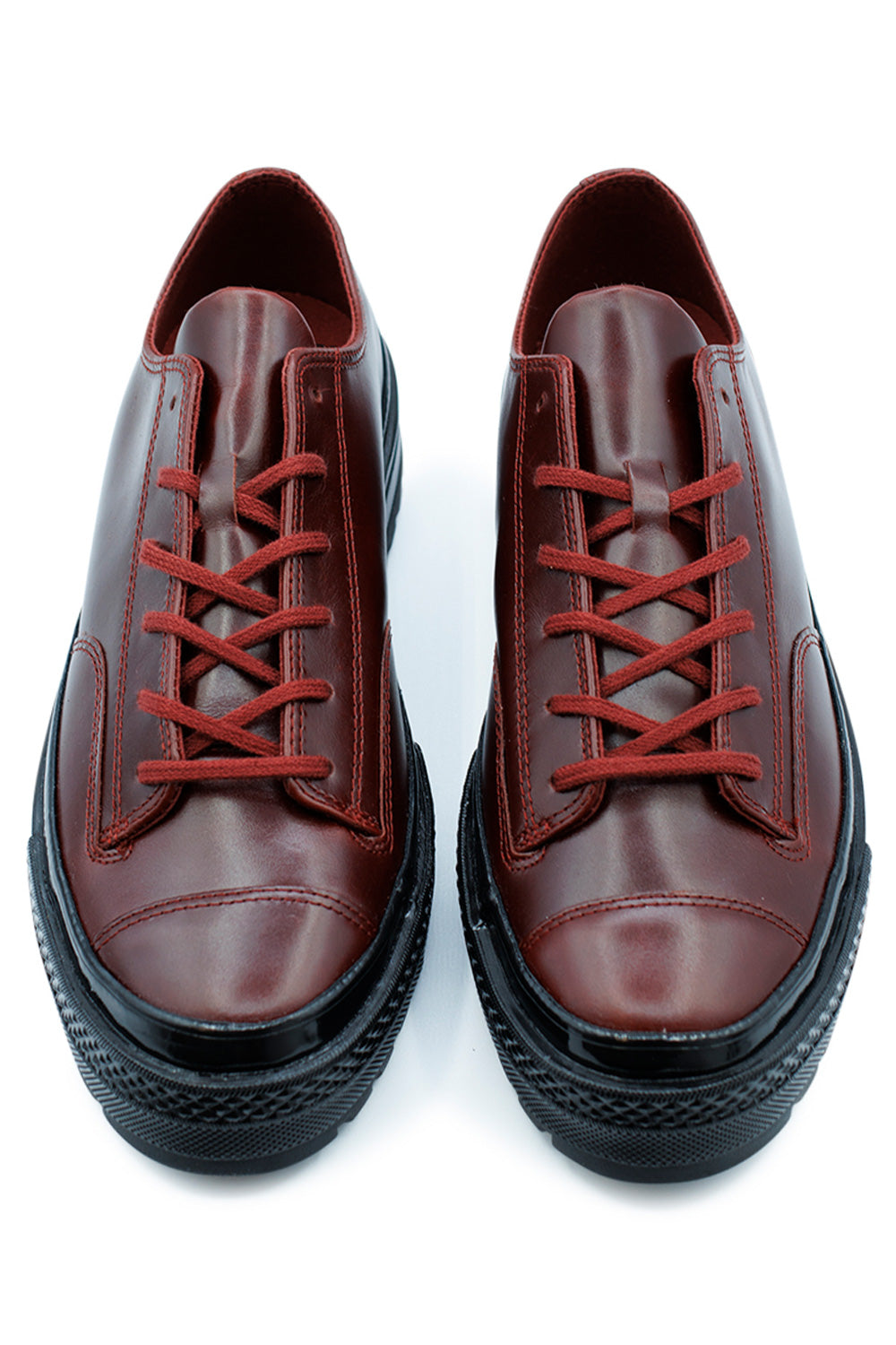 Unisex Converse Chuck 70 National OX Shoe Rottin Apple Rottin Apple Black, leather sneaker with houndstooth lining and durable canvas details.