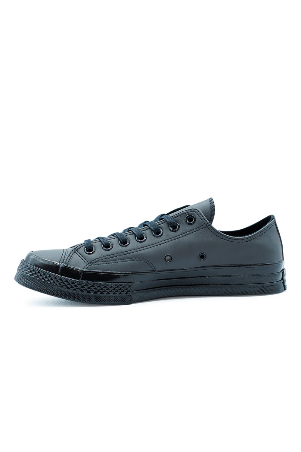 High-quality Converse Chuck 70 OX Black Dark Matter Black, timeless leather sneaker blending vintage basketball heritage with modern comfort.