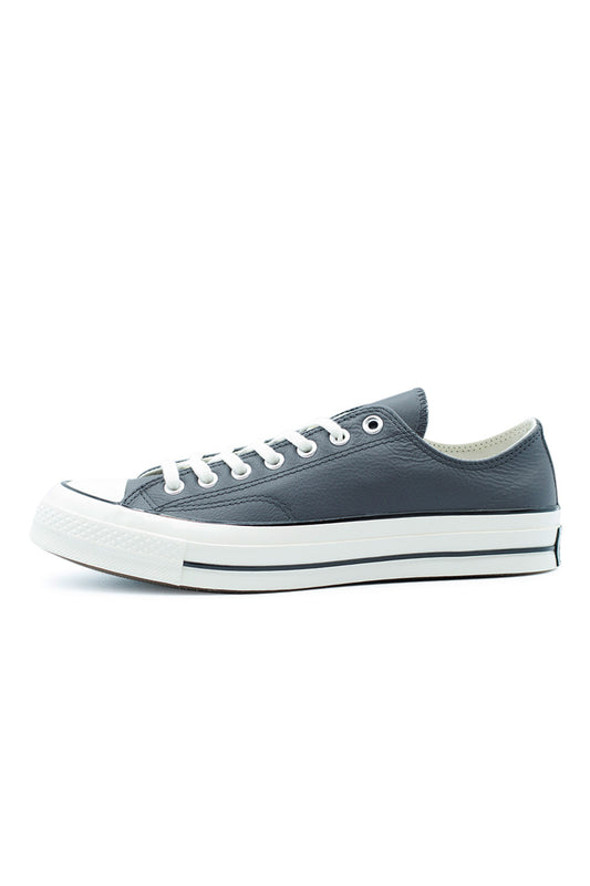 Converse Chuck 70 OX Dark Matter Dark Matter Egret unisex low-top sneaker with premium leather upper and OrthoLite cushioning.