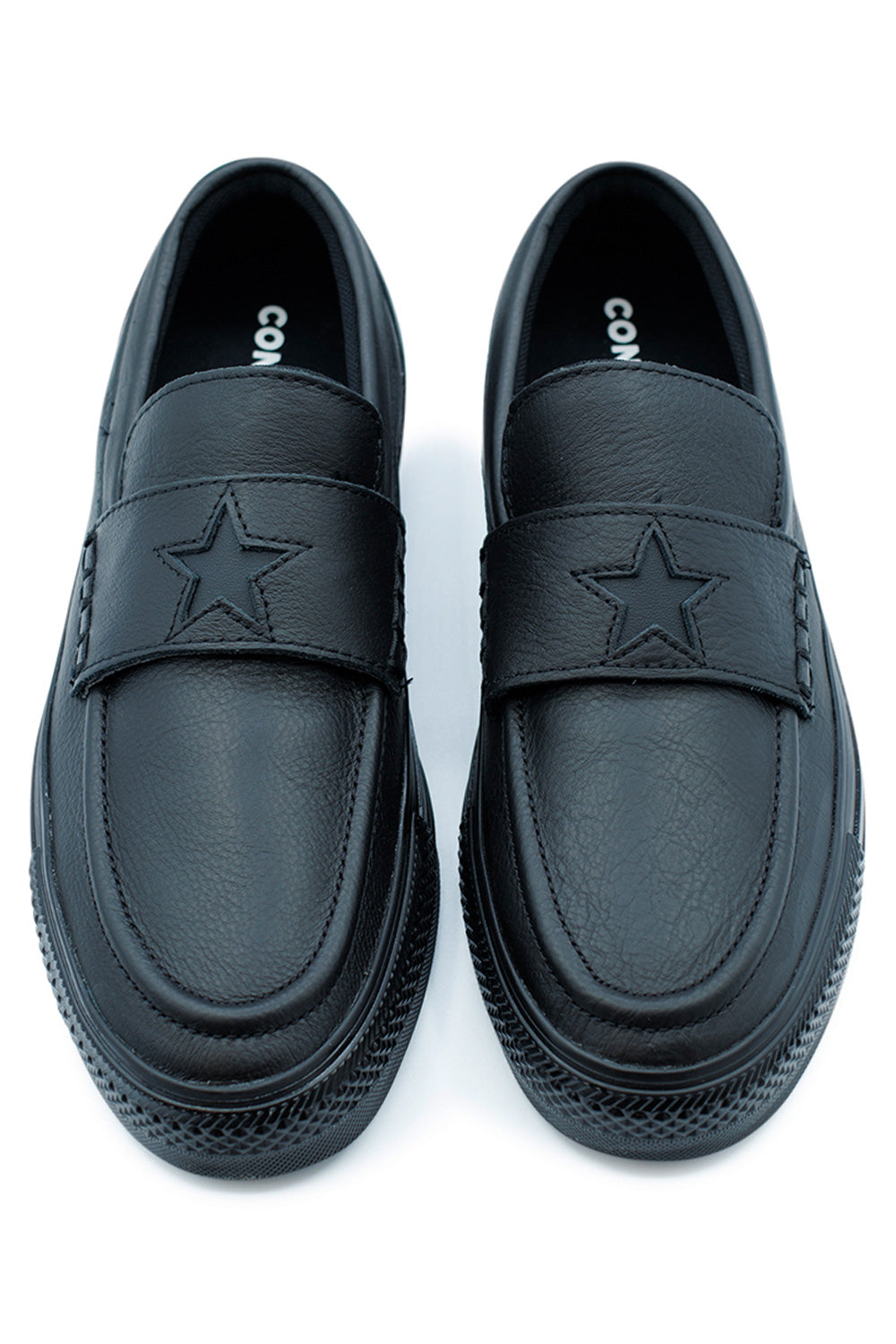 Converse Chuck Taylor All Star Loafer Black Black Black, premium full-grain leather slip-on shoe with cut-out star logo and wider fit.