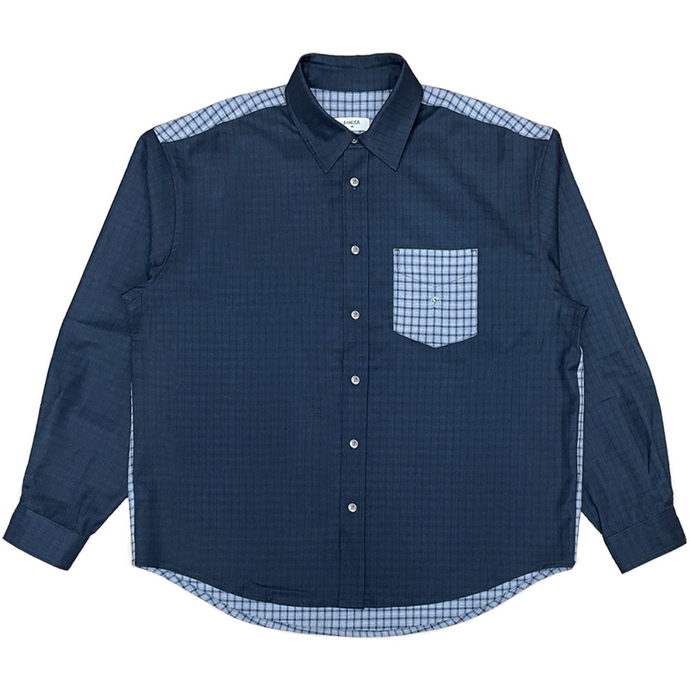 Front flat lay view of the Dancer Split Checked Shirt in Navy, featuring a relaxed two-tone cotton skate silhouette with dark navy micro-check front panels and sleeves, contrasted by light blue grid-checked shoulder yokes, hem lining trim, and a chest patch pocket, finished with a classic point collar and white buttons down the center placket.