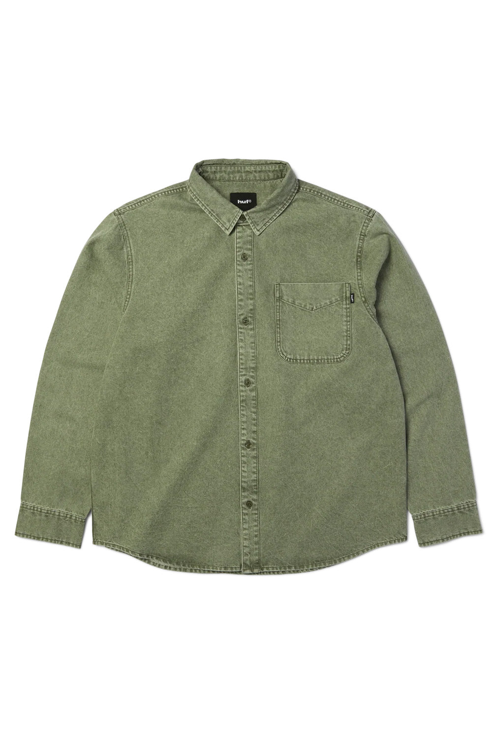 Front flat lay view of the HUF Carson Overdyed Denim Long Sleeve Shirt in mineral-washed olive green, constructed from 235g 100% cotton denim, featuring a point collar, tonal green buttoned front placket, curved hem, long sleeves with buttoned cuffs, and a single left chest patch pocket accented with a black HUF woven logo flag label