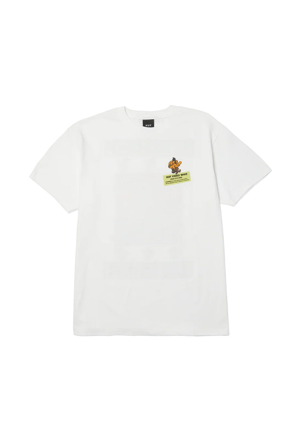 Front flat lay view of the white HUF Video Genie T-Shirt, showing the short-sleeve cut, ribbed crewneck collar, internal black HUF neck label, and a small left-chest graphic of a yellow cartoon genie floating above a yellow VHS rental store sticker badge