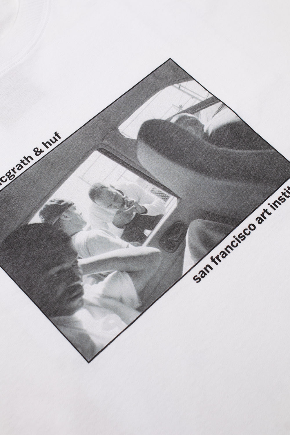 Close-up of the HUF x Dennis McGrath Paved With Gold T-Shirt chest print featuring San Francisco Art Institute photography and authentic skateboarding culture imagery