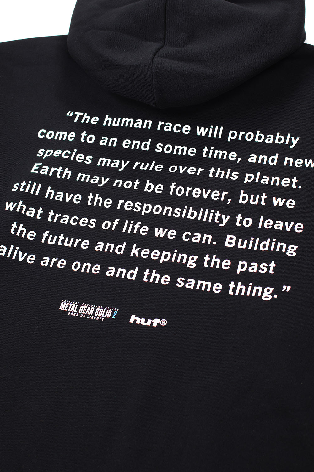 Back view of HUF Metal Gear Solid Liberty hoodie in black with printed quote graphic, archival game inspired design and woven HUF x MGS neck label