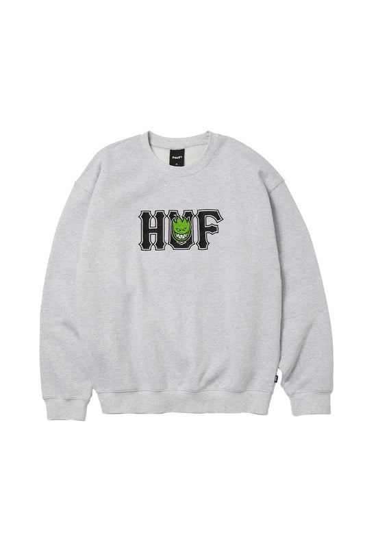 Front view of the HUF X Spitfire Union Crewneck Sweatshirt in heather grey, crafted from heavy 330 grams fleece fabric, featuring large black collegiate HUF embroidery across the chest with a bright green Spitfire Bighead flame logo integrated in the middle letter.