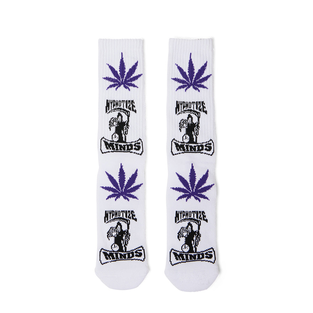 Front flat lay view of the white Huf X Three 6 Mafia Hypnotize Minds Plantlife crew socks displayed side by side[cite: 95], showing the symmetrical allover jacquard pattern with deep purple weed leaf silhouettes alternating with the black printed Hypnotize Minds banner and hooded reaper graphics across the cushioned knit cotton blend construction[cite: 95].