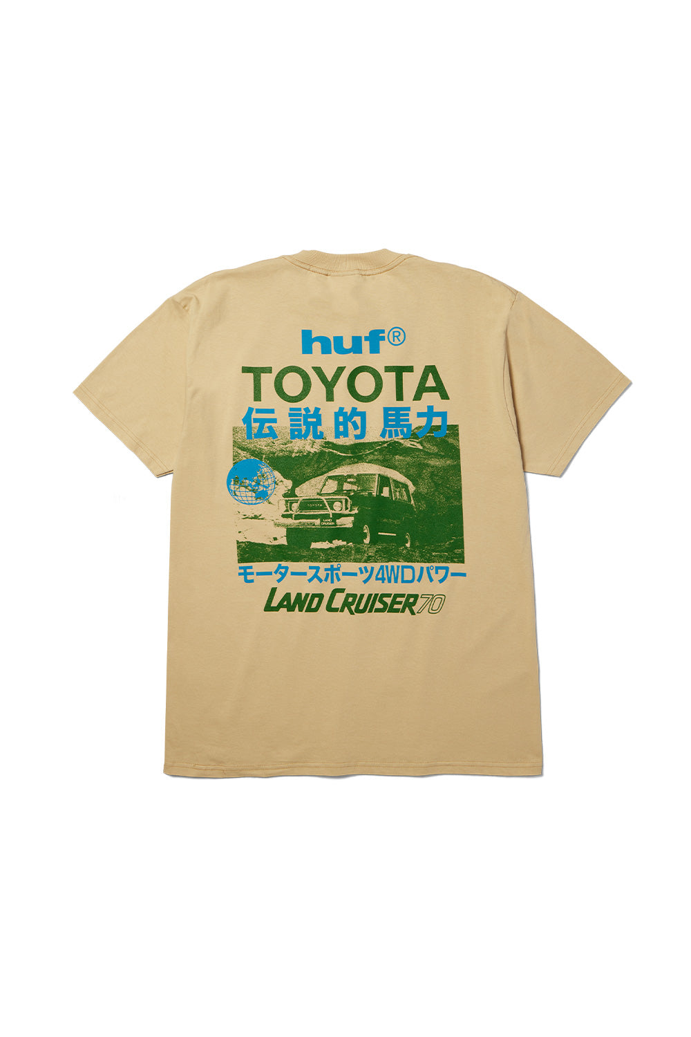 Back flat lay view of the sand beige Huf X Toyota Land Cruiser 70 SS T-Shirt made from 200g cotton, showcasing an oversized vintage off-road poster graphic on the back featuring a green-toned photograph of a classic Toyota Land Cruiser 70 climbing rocky terrain, accompanied by bold blue "huf®", dark green "TOYOTA", and bright blue Japanese Kanji characters.